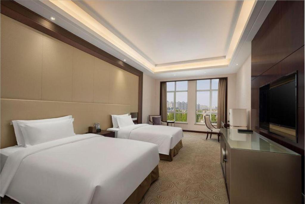 Linyi Blue Horizon International Hotel Yi He Kültér fotó
